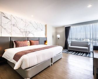 Sinsuvarn Airport Suite Hotel - Bangkok - Habitación