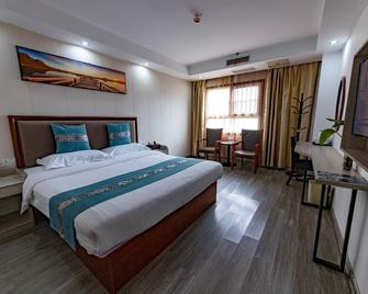 Greentree Inn Anhui Anqing Taihu East Renmin Road Cultural Expo Park Express Hotel - Anqing - Bedroom
