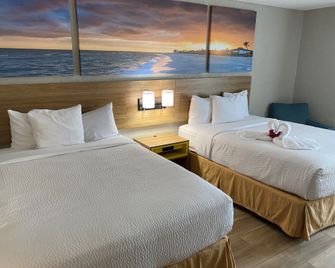 Days Inn & Suites by Wyndham Fort Pierce Midtown - פורט פירס - חדר שינה