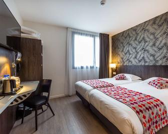 Brit Hotel Ploermel - Hotel de l'Hippodrome - Плоермель - Спальня