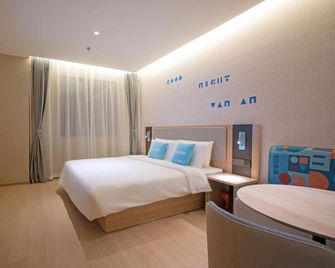 Home Inn neo(Chaozhou Bell Tower People's Square Branch) - Chaozhou - Bedroom