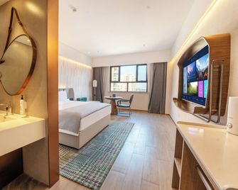 Turpan Wanda Moments Hotel - Turfán - Habitación