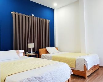 Phu Tai Center Hotel - Qui Nhon - Slaapkamer