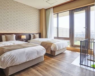 Hotel Cocoland - Ube - Camera da letto