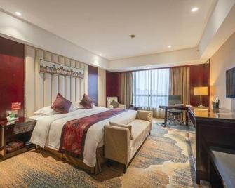 Mingguang Century Margin International Hotel - Chuzhou - Bedroom