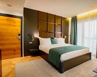 Ador Hotel - Pristina - Slaapkamer
