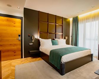 Ador Hotel - פריסטינה - חדר שינה