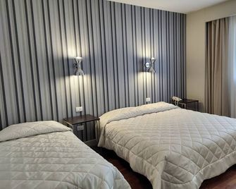 Hotel Datini - Прато - Спальня