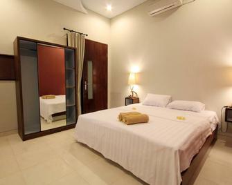 Saren Guesthouse Bali - North Kuta - Habitación