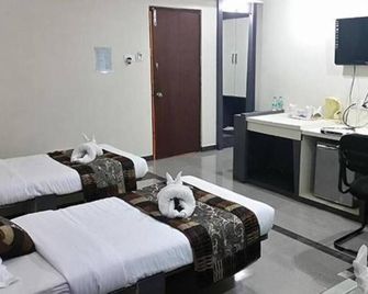 Vora Corporate Inn - Nagpur - Habitación