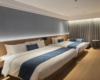 Golden Star Hotel - Quanzhou - Спальня