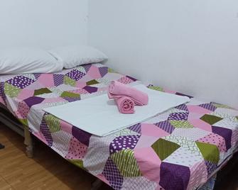 Ekonumi Rooms At Benrosi Plaza - מנילה - חדר שינה