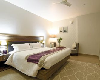 Hotel Poinisuk - Shillong - Schlafzimmer