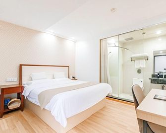 Greentree Inn Tianjin Tanggu Hebei Road Foreign Commodities Market Business Hotel - Τιαντζίν - Κρεβατοκάμαρα