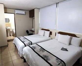 Hotel Mateos 1215 - לאון - חדר שינה