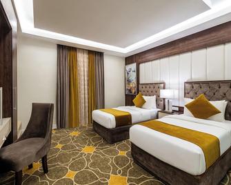Garden Millennium Hotel - Джазан - Спальня