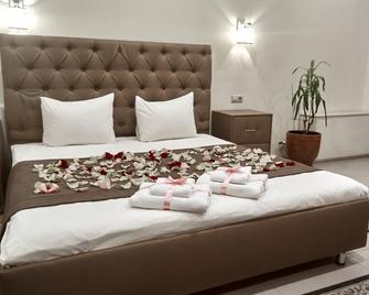 Sofia Style Hotel - Tjumen - Schlafzimmer