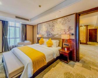 Jiande Xin'anju Maison New Century Hotel - Jinhua - Κρεβατοκάμαρα