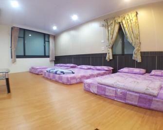 Long Yuan Hotel - Budai Township - Bedroom