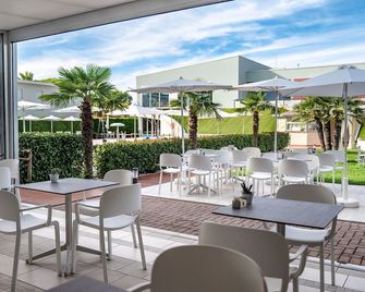 Domino Suite Hotel & Residence - יסולו - מסעדה