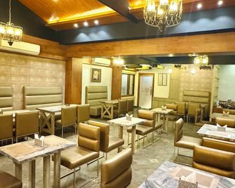 Onyx Garden Boutique Hotel - Guwahati - Restaurante
