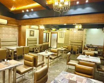 Onyx Garden Boutique Hotel - גוואטי - מסעדה