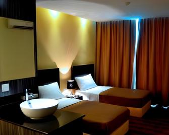 Zotel Business & Leisure Hotel - Кучинг - Спальня