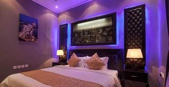 تالين الصحافة للشقق الفندقية - الرياض - غرفة نوم