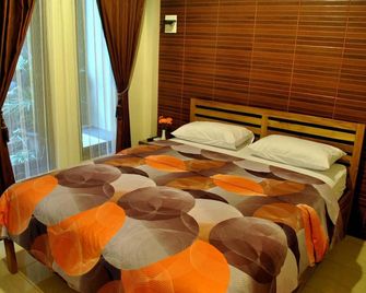 Aloha Hotel Yogyakarta - Yogyakarta - Habitación