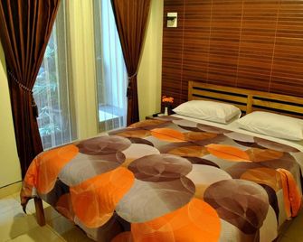 Aloha Hotel - Yogyakarta - Habitación