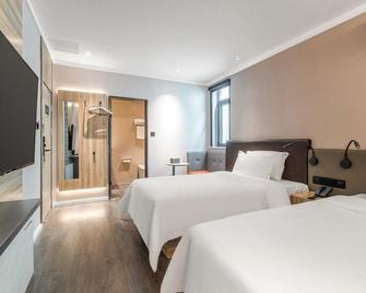 Hanting Hotel Qingdao Chengyang Liuting Airport - Qingdao - Habitación