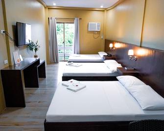 The Mang-Yan Grand Hotel powered by Cocotel - Puerto Galera - Makuuhuone