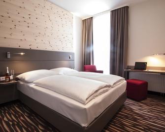 Amaro Hotel - Bergkirchen - Bedroom