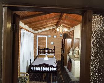 Biohotel Ecohouse - Guarne - Habitación