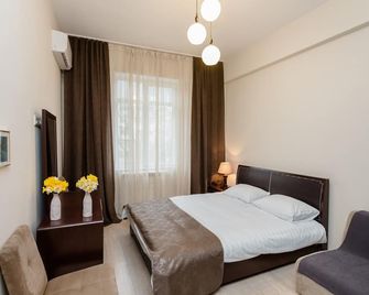 Falcon Apartments - Rustaveli - Tiflis - Schlafzimmer
