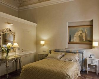 Palazzo Carletti - מונטפולצ'אנו - חדר שינה