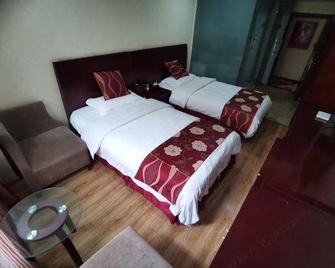 Nanjiang Yukun Business Hotel - Bazhong - Bedroom