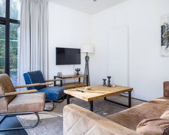 Holiday Home Maridu Family L-Cube - Arnheim - Wohnzimmer