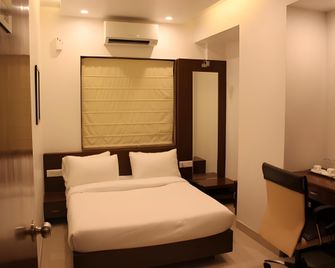 Fabhotel Loharker Ramdaspeth - Nagpur - Habitación