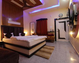 Saranga - the deer farmstay resort - Kanha - Ložnice