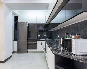 City Center Apartment Mashtots Street 33-1 - Yerevan - Kitchen