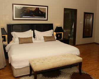 Clear Essence California Spa and Wellness Resort - Ikoyi - Schlafzimmer