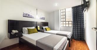 Hotel Dorado 100 - Bogotá - Schlafzimmer