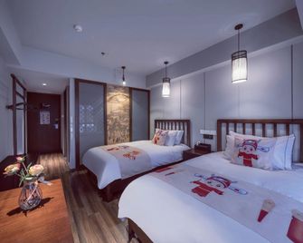 Grand Cozy Hotels - Nanjing - Soveværelse
