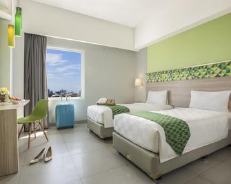 Khas Makassar Hotel - Makassar - Bedroom