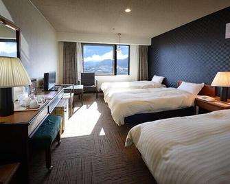 Hotel Sun Hitoyoshi - Hitoyoshi - Camera da letto