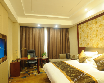 Ganzhou Pearl Hotel - Ganzhou - Спальня