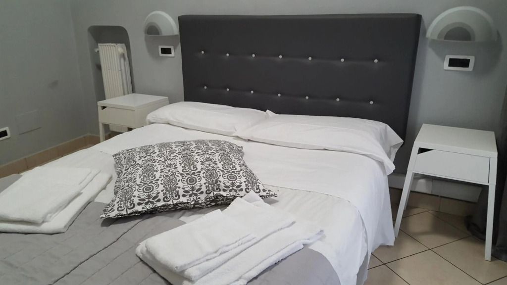 Hotel Milano - פיזה - חדר שינה