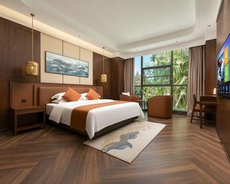 Hanzhong Tianhan Langyue Hotel - Hanzhong - Спальня