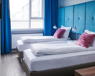 Oddsson Hotel - Reykjavík - Schlafzimmer